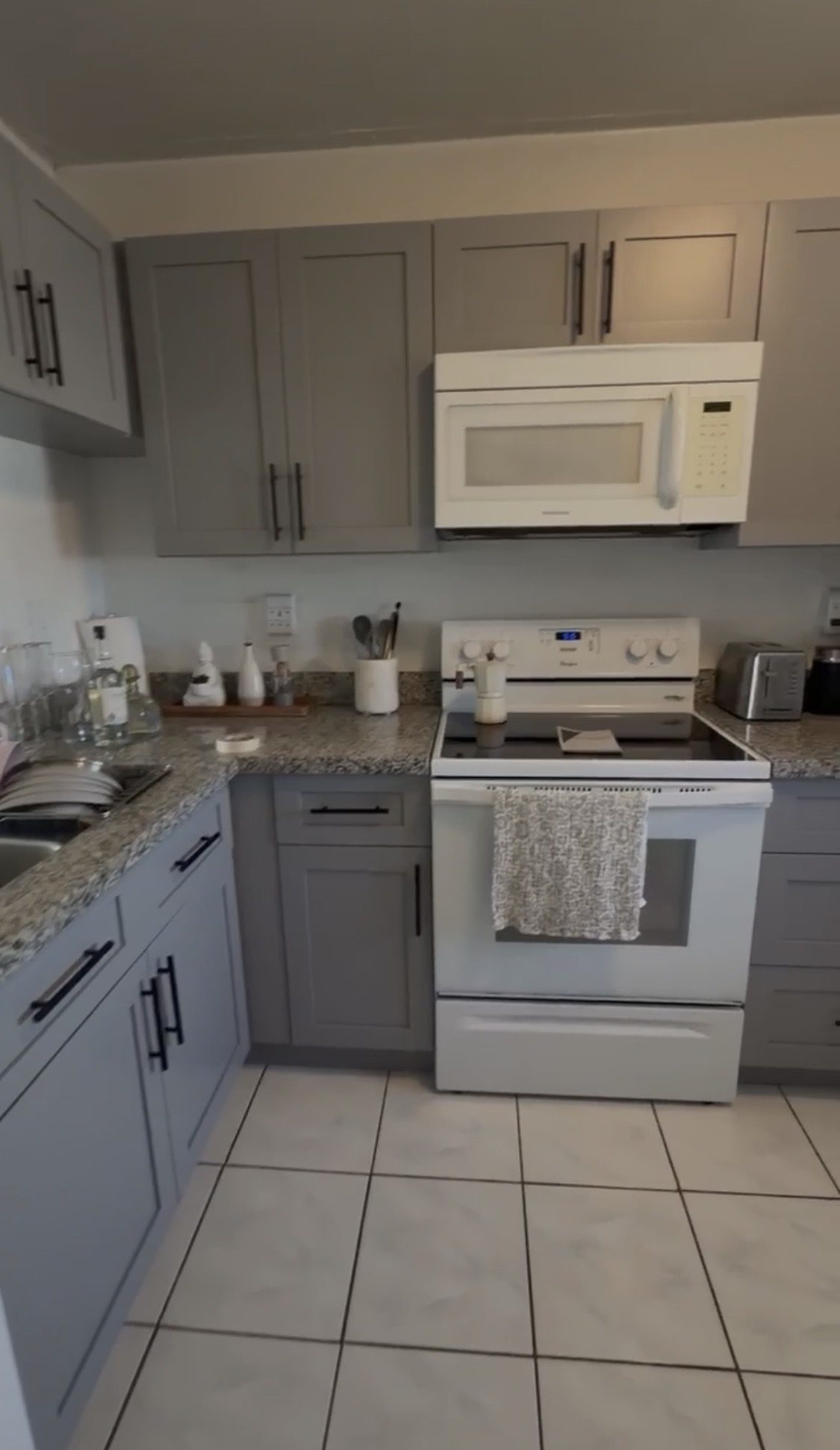 Refreshed kitchen with painted cabinets and new hardware